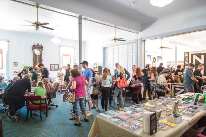 People lined up to get a tarot card reading from Dark Star Ministry.
